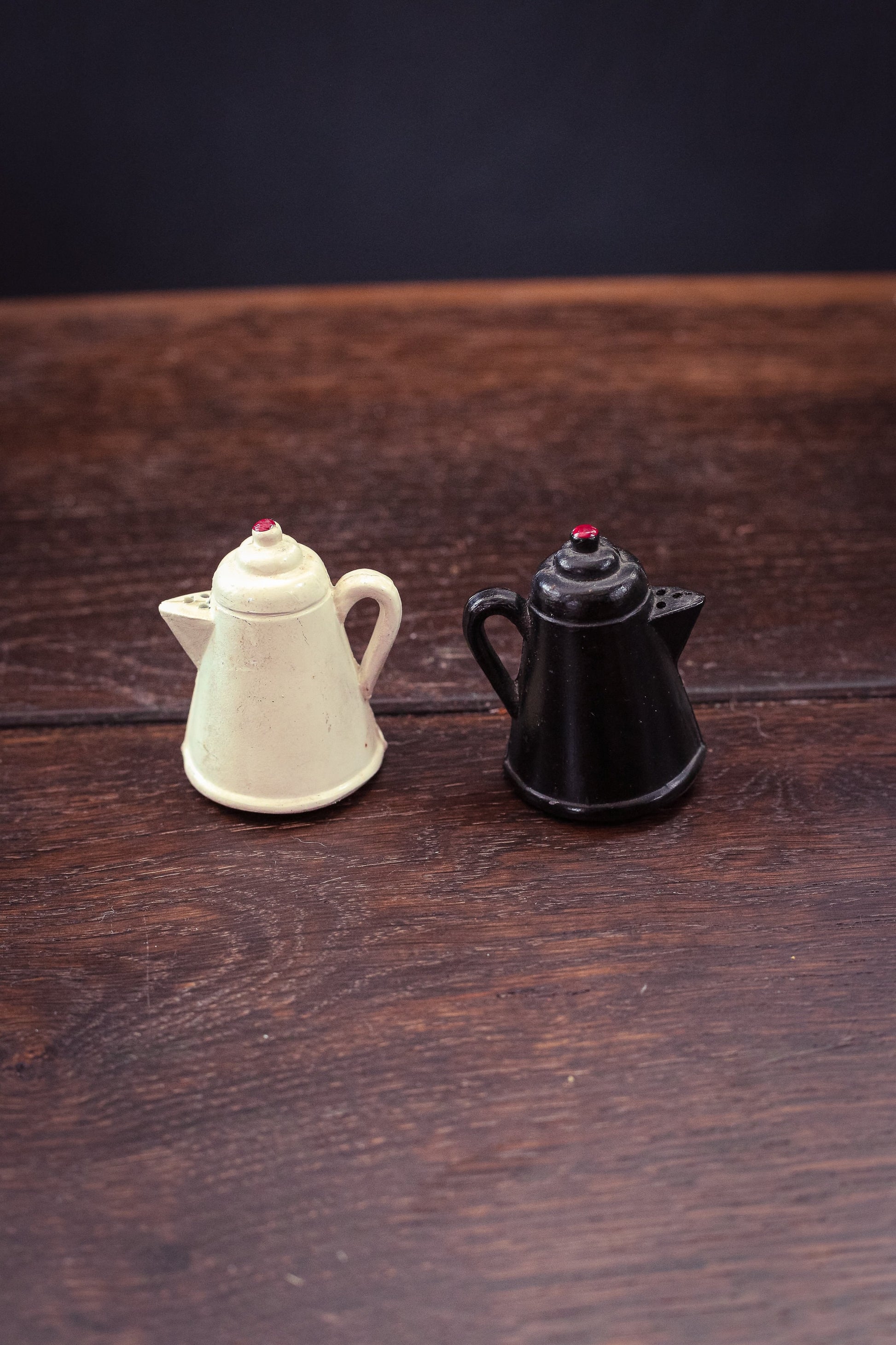 Pair of Black/White Floral Painted Metal Salt & Pepper