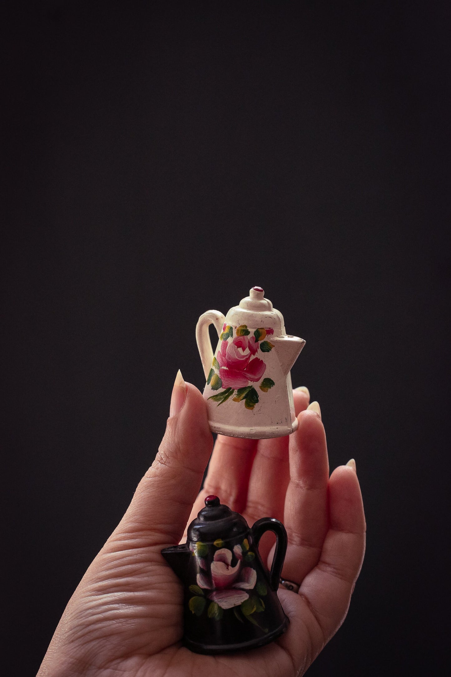 Pair of Black/White Floral Painted Metal Salt & Pepper